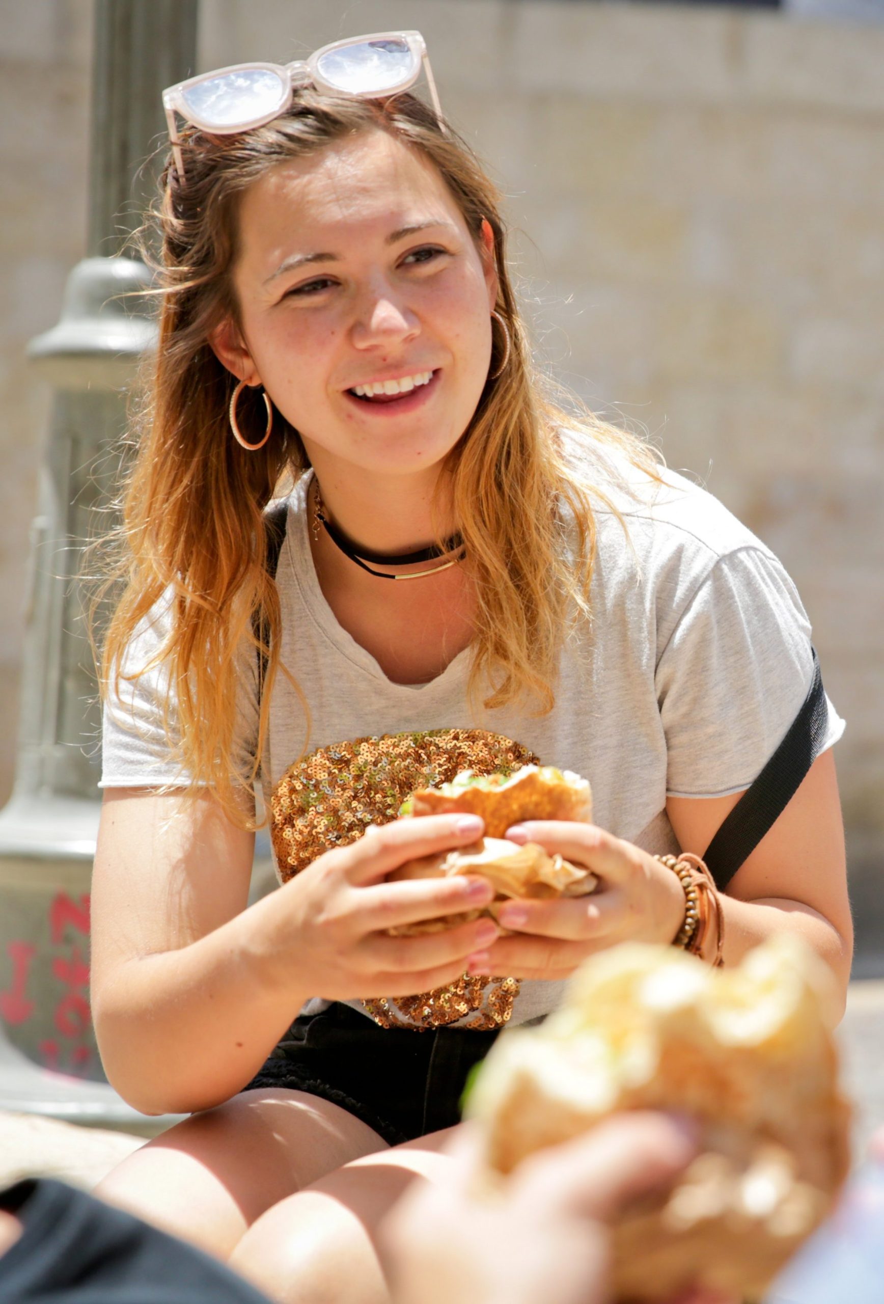 Student eating falafel.